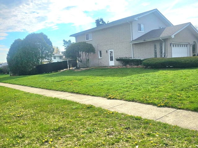 12416 W Prairie Dr, Homer Glen, IL 60491 - view of property exterior featuring an attached garage and brick siding