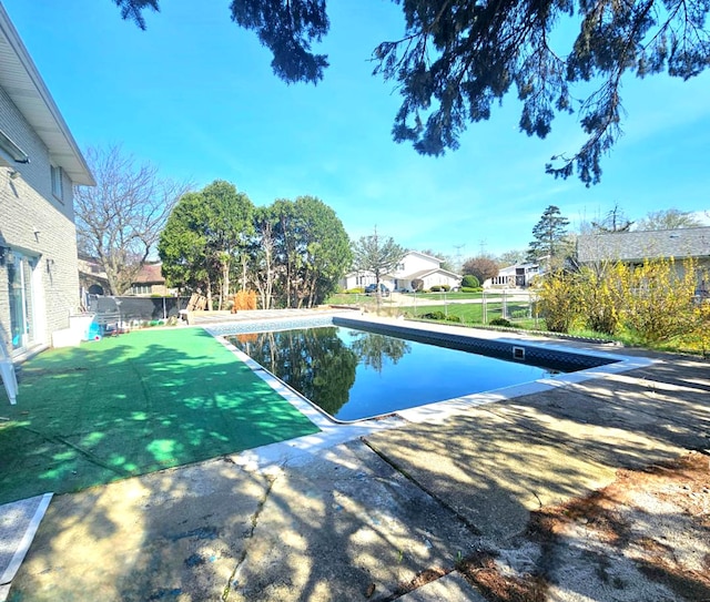 12416 W Prairie Dr, Homer Glen, IL 60491 - swimming pool with a residential view and a patio