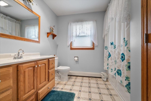 13079 N 1800 E Rd, Pontiac, IL 61764 - bathroom with a baseboard radiator, vanity, and tile patterned floors