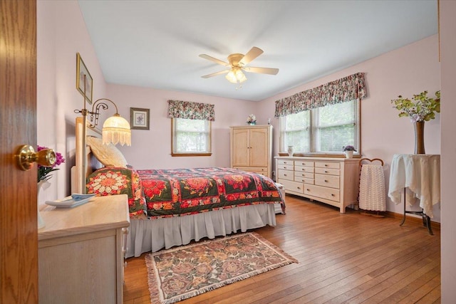 13079 N 1800 E Rd, Pontiac, IL 61764 - bedroom featuring hardwood / wood-style floors and ceiling fan