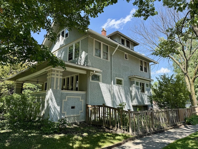 500 Fair Oaks Ave, Oak Park, IL 60302 - view of home's exterior featuring stucco siding and a chimney