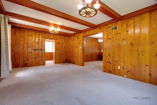 80 N Lake Ave, Third Lake, IL 60030 - carpeted spare room with a chandelier, beam ceiling, and wooden walls