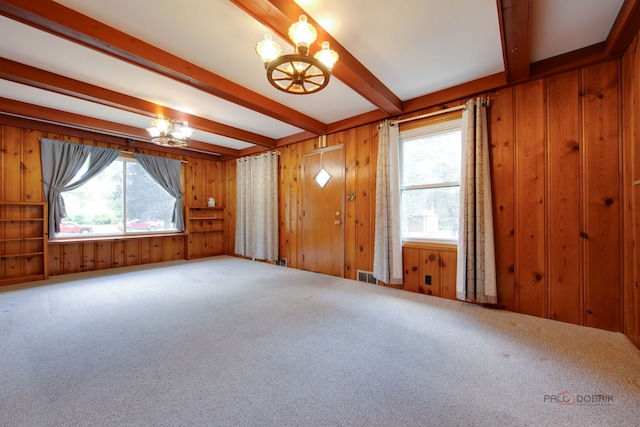 80 N Lake Ave, Third Lake, IL 60030 - carpeted entrance foyer featuring a chandelier, beamed ceiling, healthy amount of natural light, and wooden walls