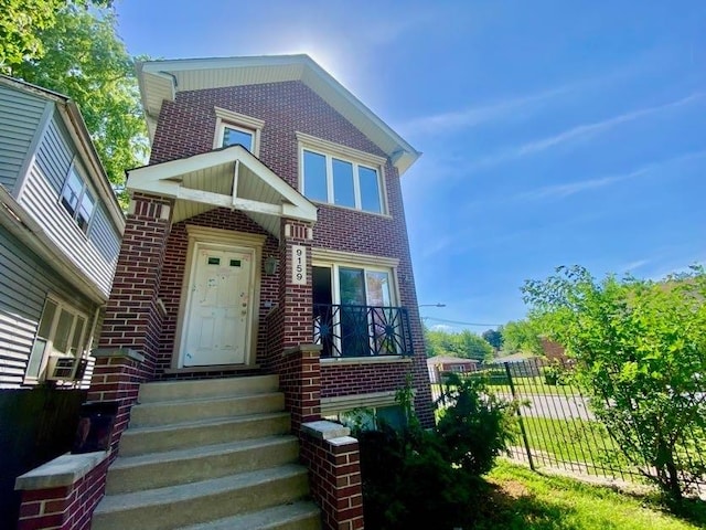 9159 S Dobson Ave, Chicago, IL 60619 - view of front of house with brick siding
