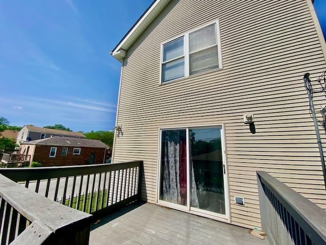 9159 S Dobson Ave, Chicago, IL 60619 - view of wooden balcony with a wooden deck