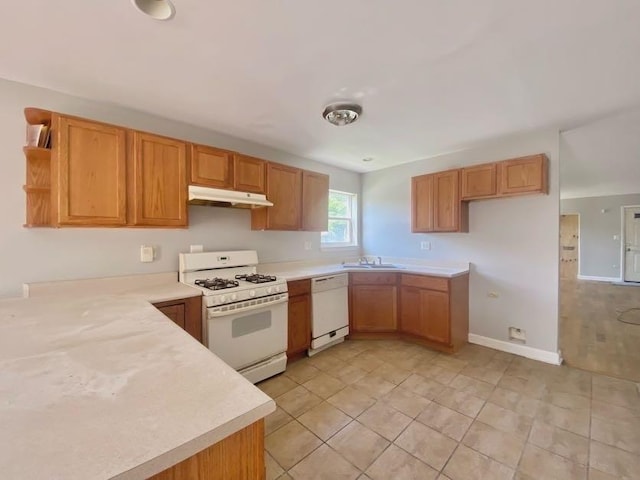 9159 S Dobson Ave, Chicago, IL 60619 - kitchen featuring white appliances, under cabinet range hood, open shelves, light countertops, and light tile patterned flooring