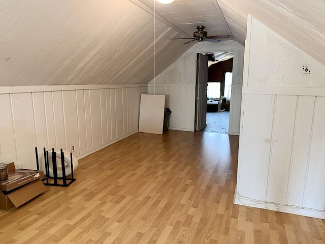 826 S E Ave, Oak Park, IL 60304 - bonus room with wood finished floors, lofted ceiling, a ceiling fan, and a decorative wall