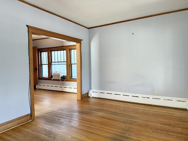 826 S E Ave, Oak Park, IL 60304 - empty room featuring a baseboard heating unit, ornamental molding, and wood finished floors