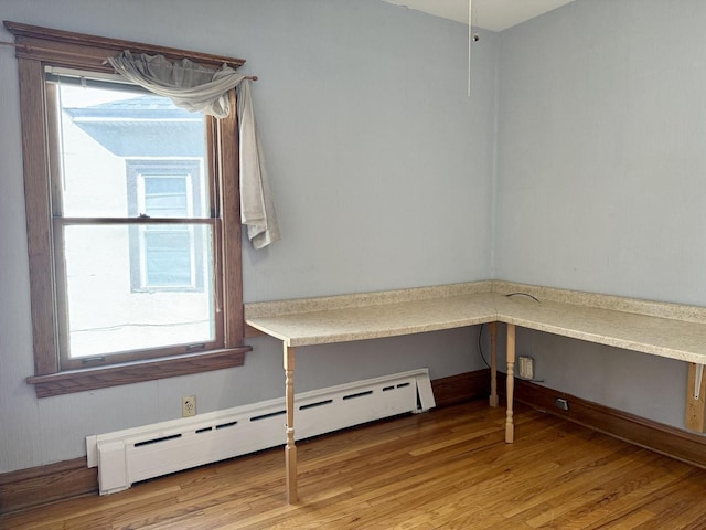826 S E Ave, Oak Park, IL 60304 - unfurnished office with a baseboard radiator, healthy amount of natural light, and wood finished floors