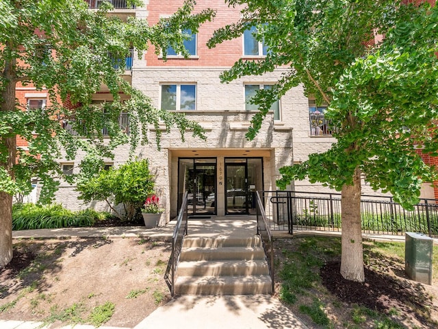 1670 Mill St Unit 208, Des Plaines, IL 60016 - entrance to property with french doors and brick siding