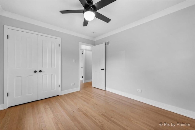 27W075 Fleming Dr, Winfield, IL 60190 - unfurnished bedroom with light wood-type flooring, a closet, a ceiling fan, and crown molding