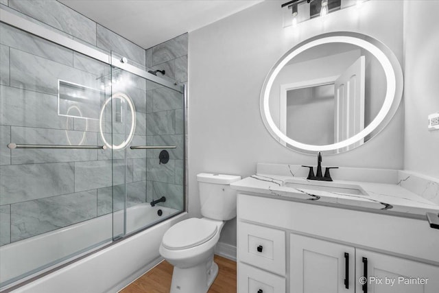 27W075 Fleming Dr, Winfield, IL 60190 - bathroom with vanity, combined bath / shower with glass door, and wood finished floors