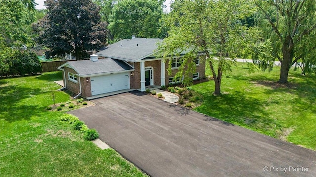 27W075 Fleming Dr, Winfield, IL 60190 - view of front of house featuring brick siding and driveway