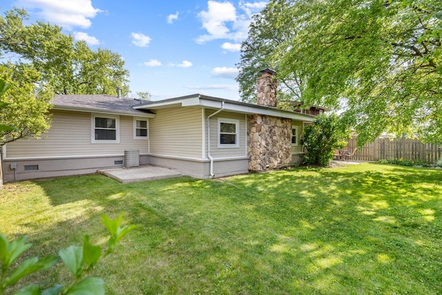 398 Clearmont Dr, Elk Grove Village, IL 60007 - rear view of property with a chimney and a patio area