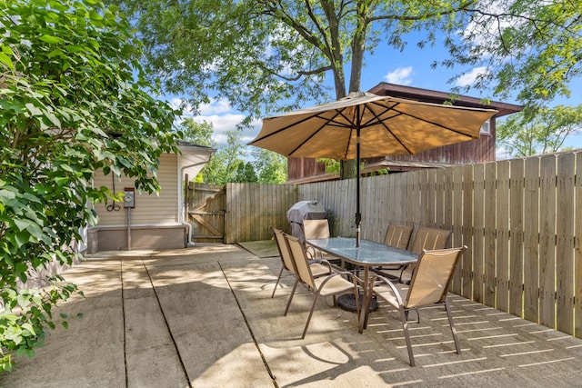398 Clearmont Dr, Elk Grove Village, IL 60007 - view of patio / terrace featuring outdoor dining space and a gate