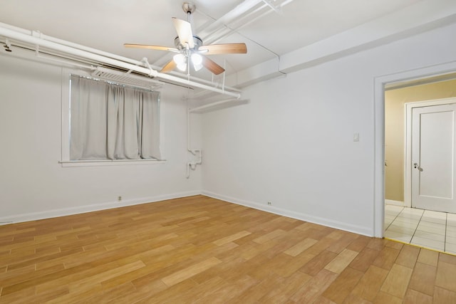 1360 E Madison Park Unit B, Chicago, IL 60615 - spare room with light wood-style flooring and ceiling fan