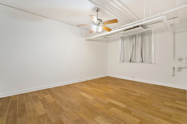 1360 E Madison Park Unit B, Chicago, IL 60615 - spare room featuring wood finished floors and a ceiling fan