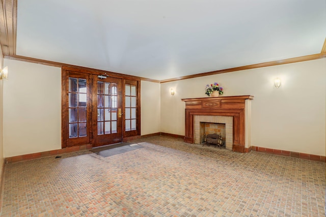 1360 E Madison Park Unit B, Chicago, IL 60615 - unfurnished living room with crown molding, a tile fireplace, and french doors