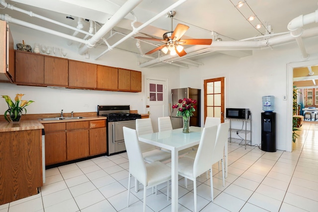 1360 E Madison Park Unit B, Chicago, IL 60615 - dining room with light tile patterned flooring and a ceiling fan