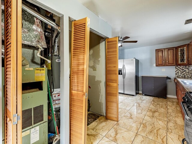 14732 Dorchester Ave, Dolton, IL 60419 - utility room with heating unit and a sink