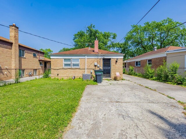 14732 Dorchester Ave, Dolton, IL 60419 - view of front of home featuring a chimney and brick siding