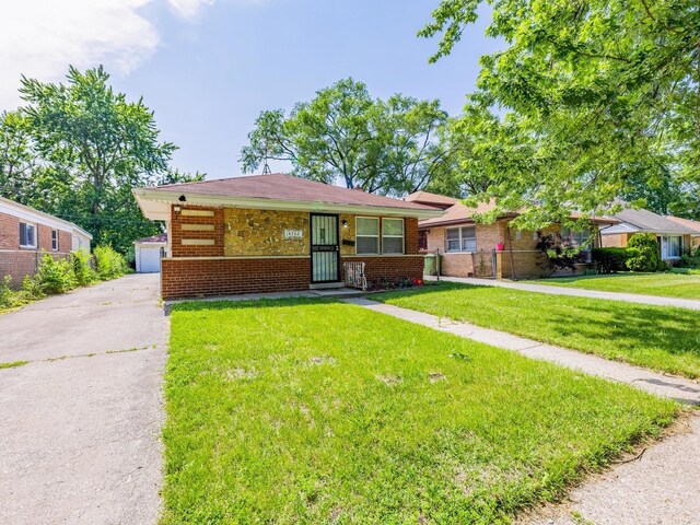 14732 Dorchester Ave, Dolton, IL 60419 - view of front of house with a front yard and brick siding