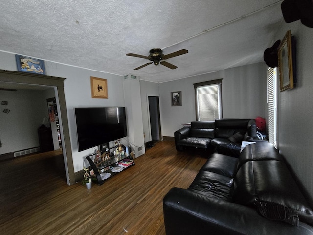 544 Charles St, Aurora, IL 60506 - living area featuring wood finished floors, ceiling fan, and a textured ceiling