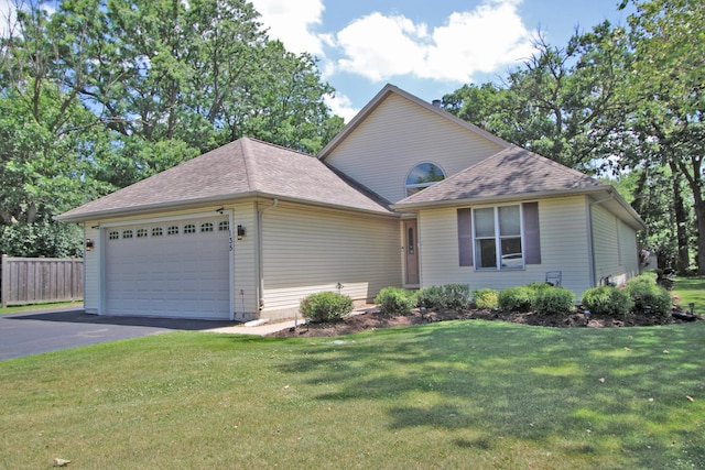 135 Miller Rd, Lake Zurich, IL 60047 - view of front of property featuring a garage, asphalt driveway, and roof with shingles