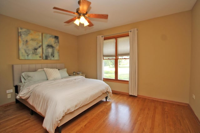 135 Miller Rd, Lake Zurich, IL 60047 - bedroom with light wood finished floors and ceiling fan