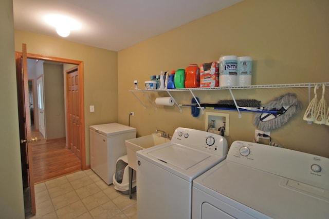 135 Miller Rd, Lake Zurich, IL 60047 - laundry room with independent washer and dryer and light tile patterned floors