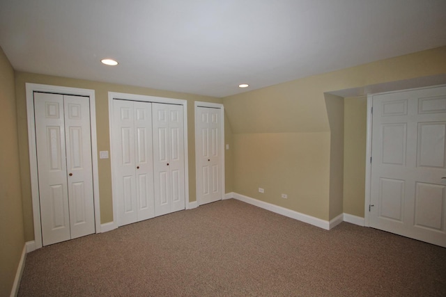 135 Miller Rd, Lake Zurich, IL 60047 - unfurnished bedroom featuring multiple closets, carpet floors, recessed lighting, and vaulted ceiling
