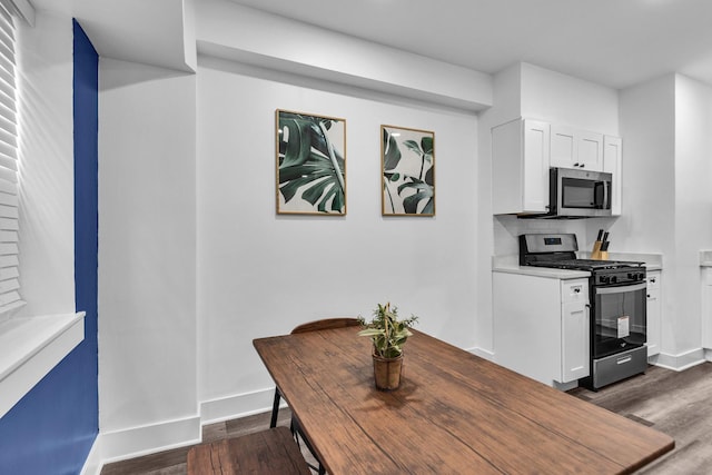 5335 N California Ave Unit 103, Chicago, IL 60625 - dining area with dark wood-style flooring