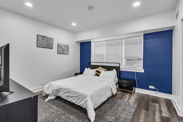 5335 N California Ave Unit 103, Chicago, IL 60625 - bedroom with cooling unit, wood finished floors, and recessed lighting