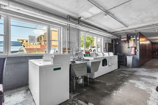5335 N California Ave Unit 103, Chicago, IL 60625 - basement featuring washer and dryer and a sink