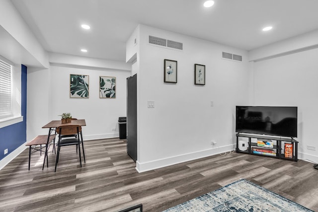 5335 N California Ave Unit 103, Chicago, IL 60625 - living area with recessed lighting and dark wood finished floors