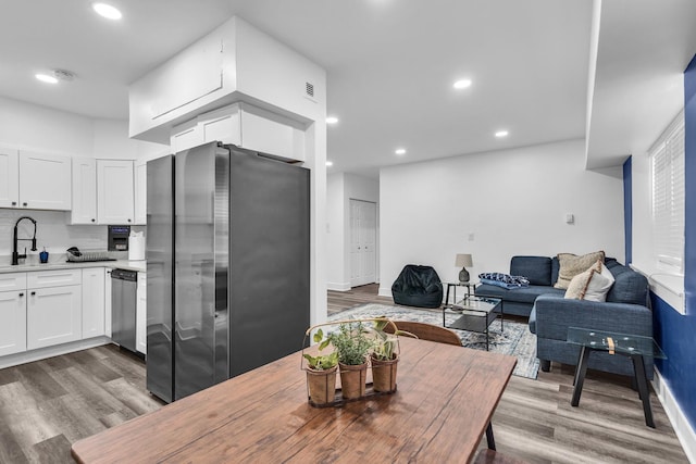 5335 N California Ave Unit 103, Chicago, IL 60625 - dining room featuring wood finished floors and recessed lighting