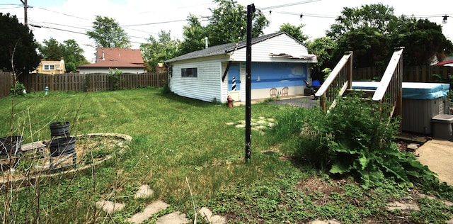 1509 Morris Ave, Berkeley, IL 60163 - view of yard with a hot tub, an outdoor structure, and a detached garage