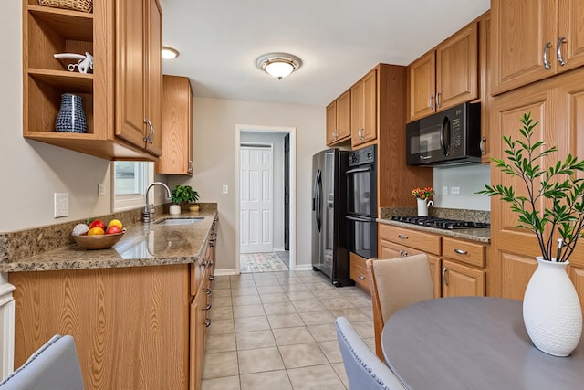 1902 N Washington St, Wheaton, IL 60187 - kitchen featuring black appliances, light tile patterned floors, stone counters, brown cabinetry, and open shelves
