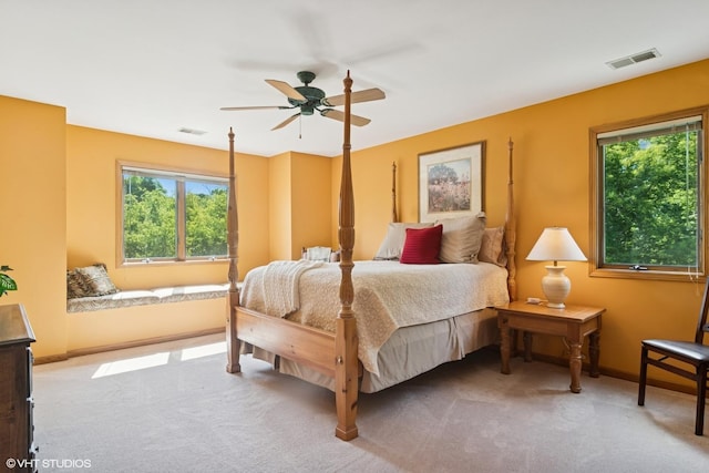 10305 Ridge Ln, Huntley, IL 60142 - bedroom with multiple windows, carpet floors, and a ceiling fan