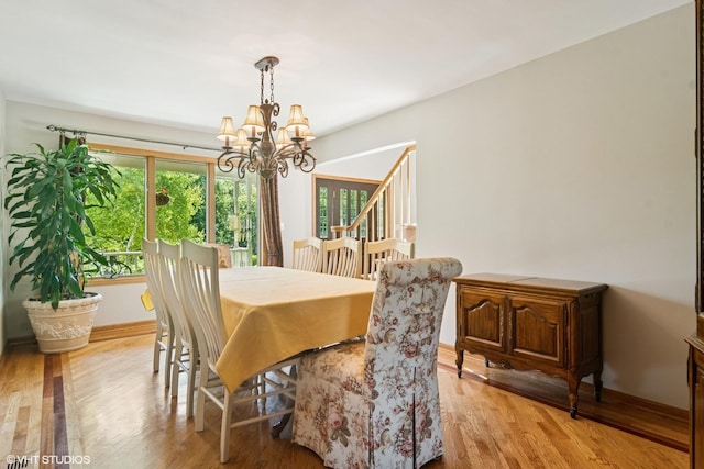 10305 Ridge Ln, Huntley, IL 60142 - dining space featuring a chandelier and light wood-style floors