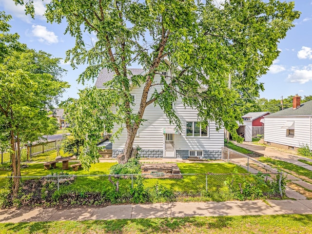 2242 S 5th St, Rockford, IL 61104 - view of front of home with a fenced backyard