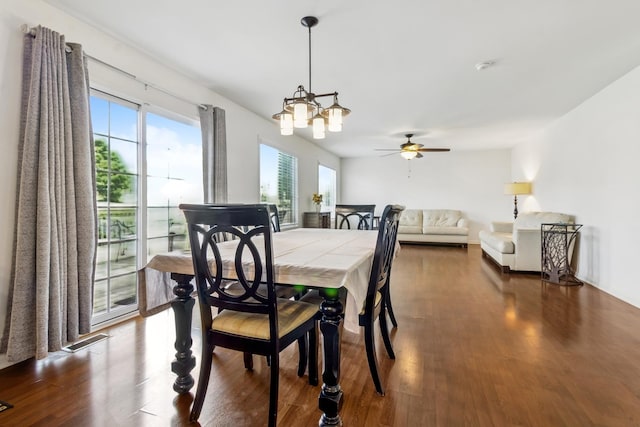 774 Dover St, Pingree Grove, IL 60140 - dining room with healthy amount of natural light, dark wood-style floors, a chandelier, and ceiling fan