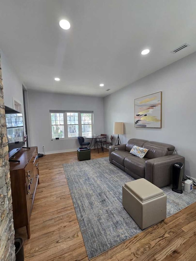 3447 W Melrose St, Chicago, IL 60618 - living area featuring wood finished floors and recessed lighting