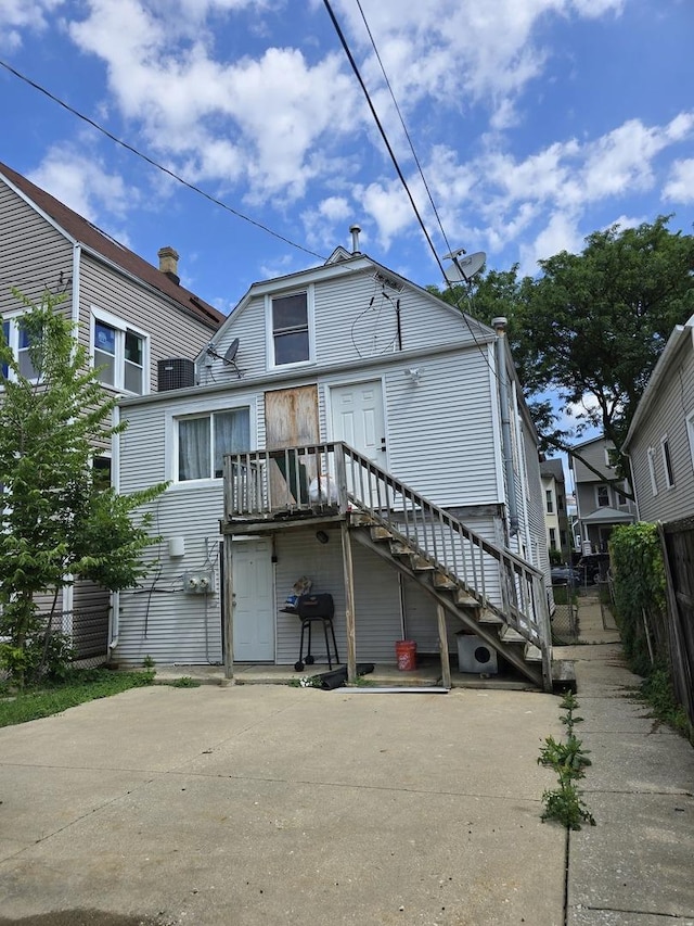 3447 W Melrose St, Chicago, IL 60618 - rear view of house with stairs
