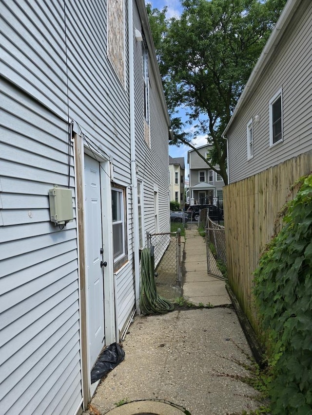 3447 W Melrose St, Chicago, IL 60618 - view of side of home with a gate and a residential view
