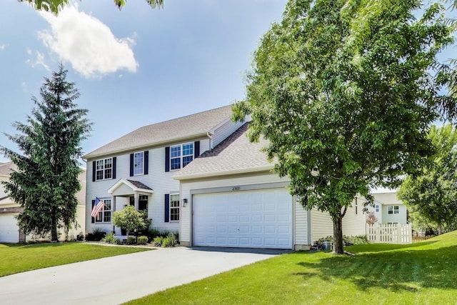 2301 Bluewater Dr, Wauconda, IL 60084 - colonial-style house with an attached garage and driveway