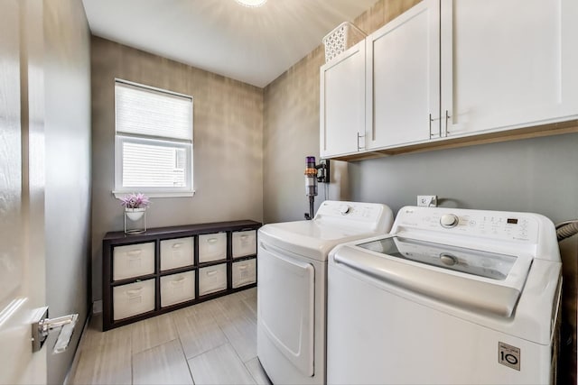 2301 Bluewater Dr, Wauconda, IL 60084 - washroom with washer and dryer and cabinet space