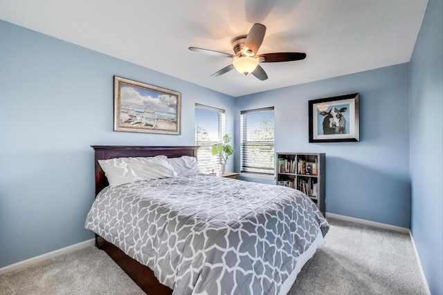 2301 Bluewater Dr, Wauconda, IL 60084 - carpeted bedroom with baseboards and ceiling fan