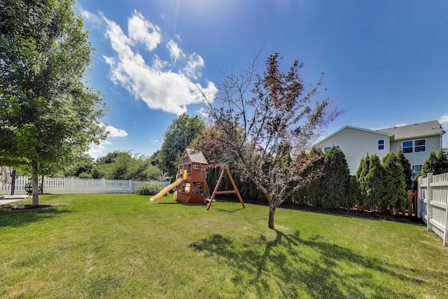 2301 Bluewater Dr, Wauconda, IL 60084 - fenced backyard with a playground
