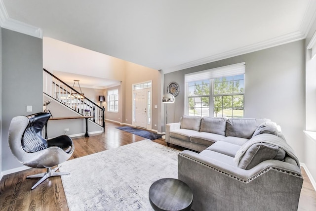 2301 Bluewater Dr, Wauconda, IL 60084 - living room with wood finished floors, ornamental molding, and stairway